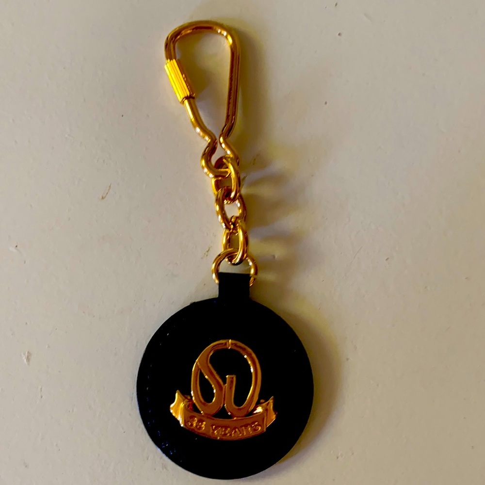 St. John vintage keychain -Rare !! 35 years anniversary